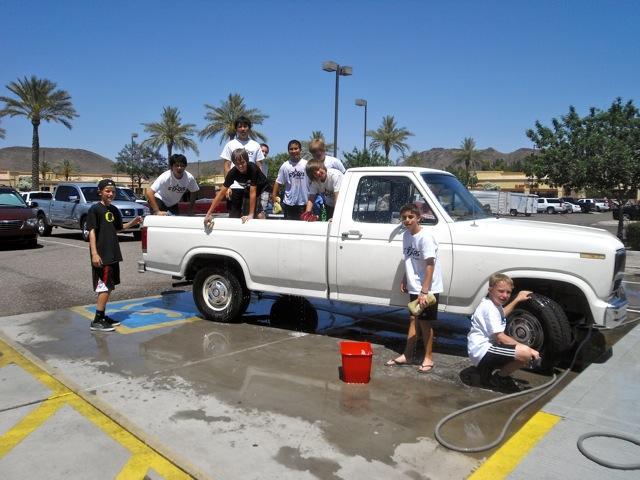 Boys wash our last customer, Tony Burgarello's truck