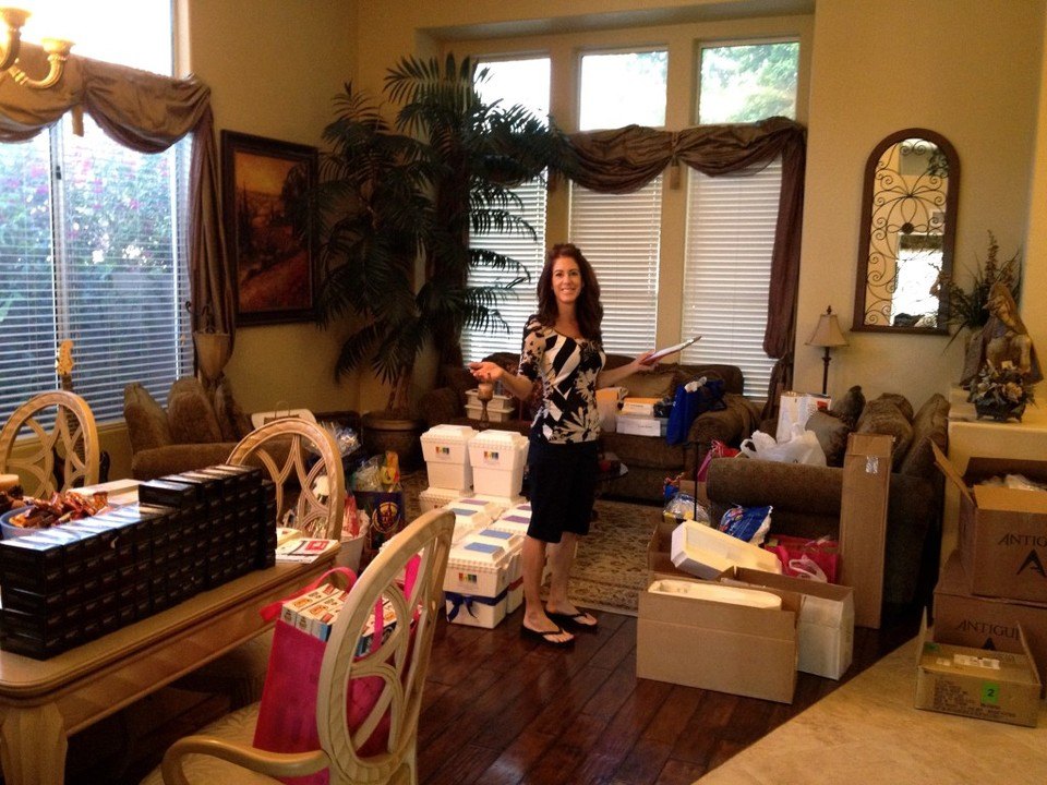 Venita in our living room preparing for our 1st Annual Charity Golf Tourney