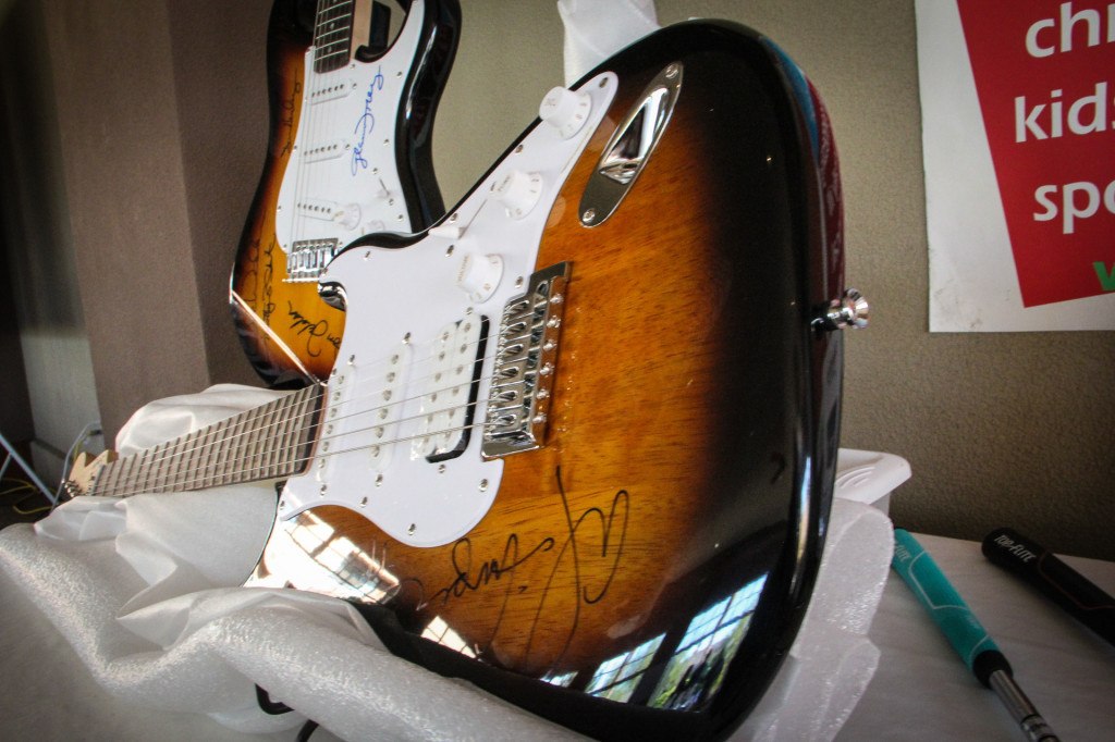 Signed Alice Cooper & Eagles guitars for LIVE Auction