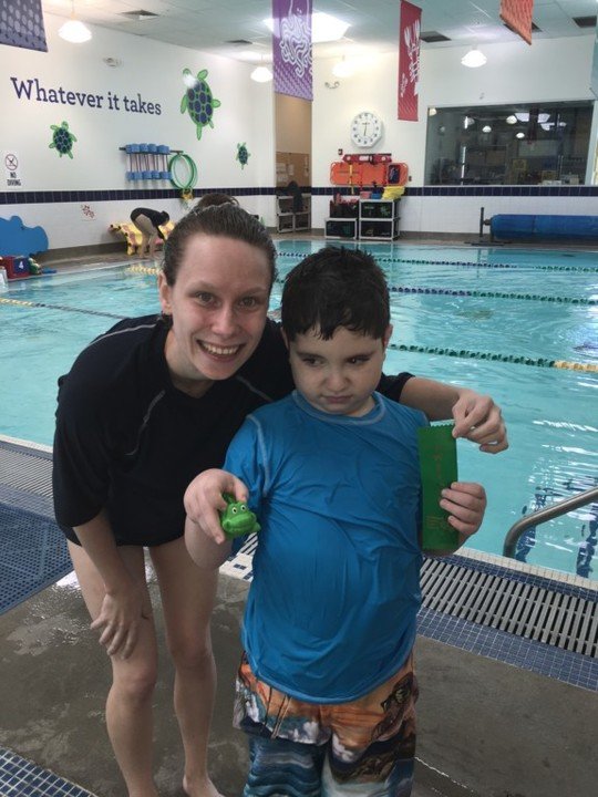 Dustin is LOVING swim class!!