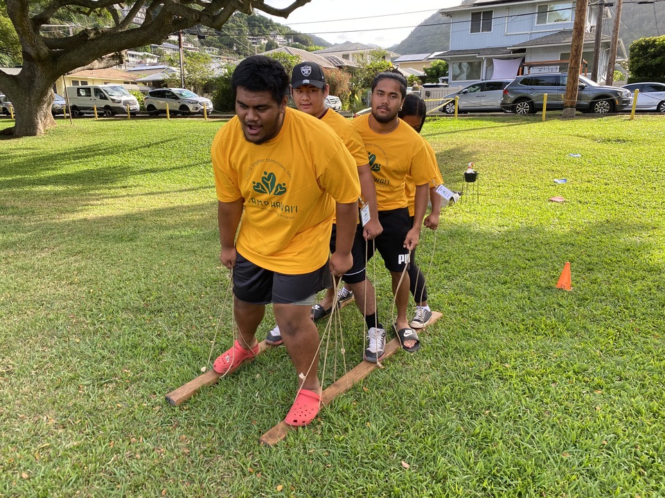 Dyllan (2nd from left) volunteers at KAMPS (Kids At-risk Mentoring Program) in Honolulu.  We are SO proud of him!  GO Dyllan!