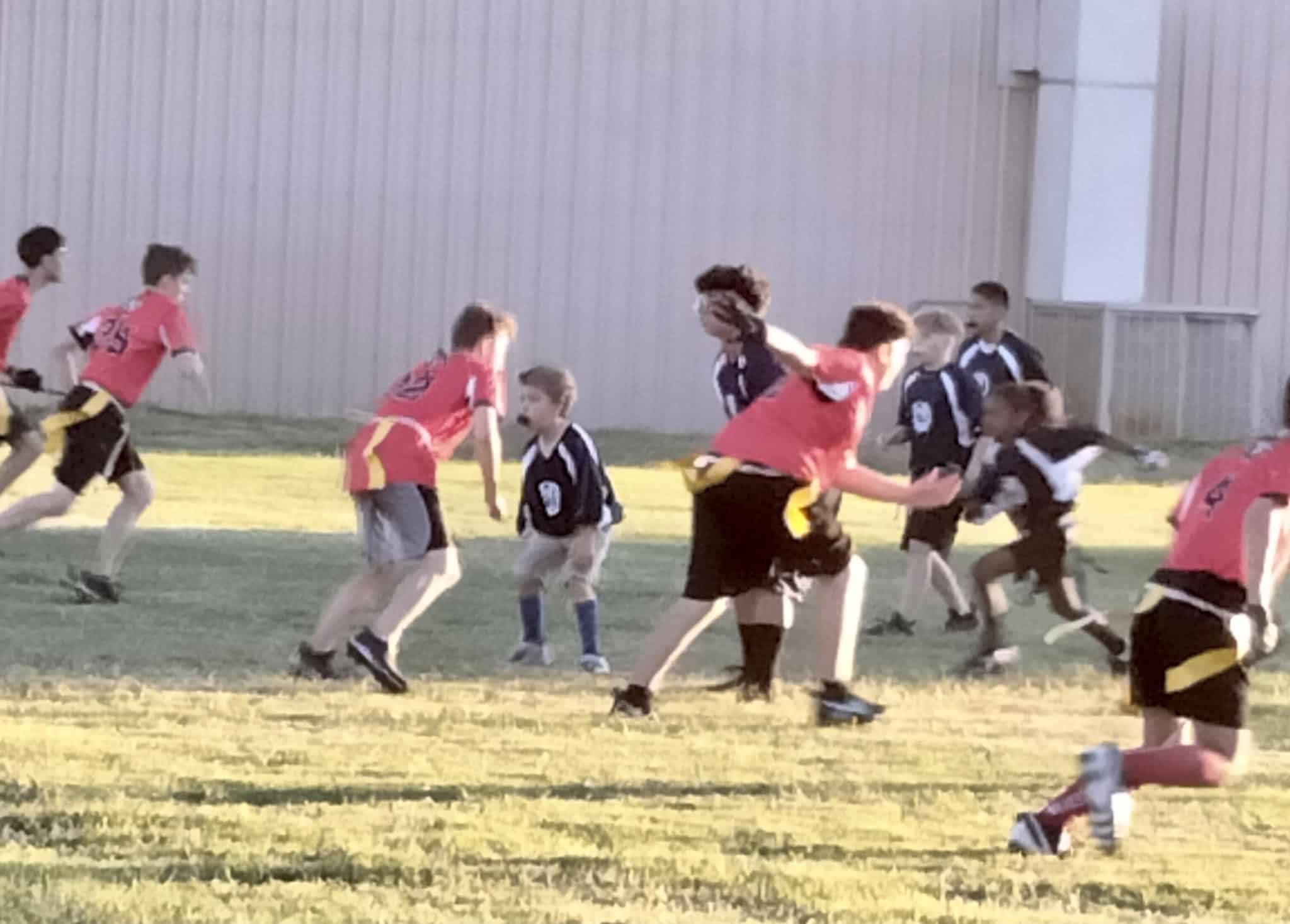 Brendan playing flag football!  Go Brendan!