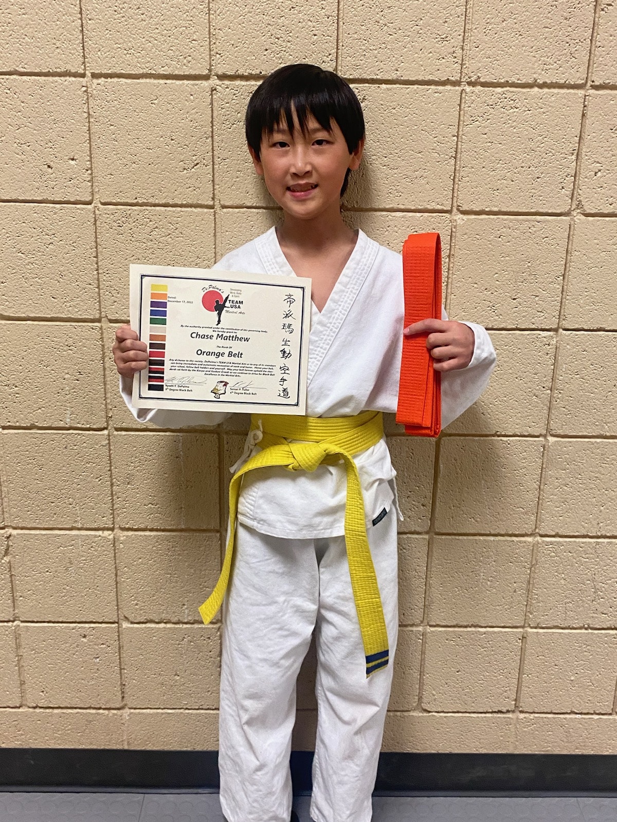 Chase with his Orange belt!  GO Chase!