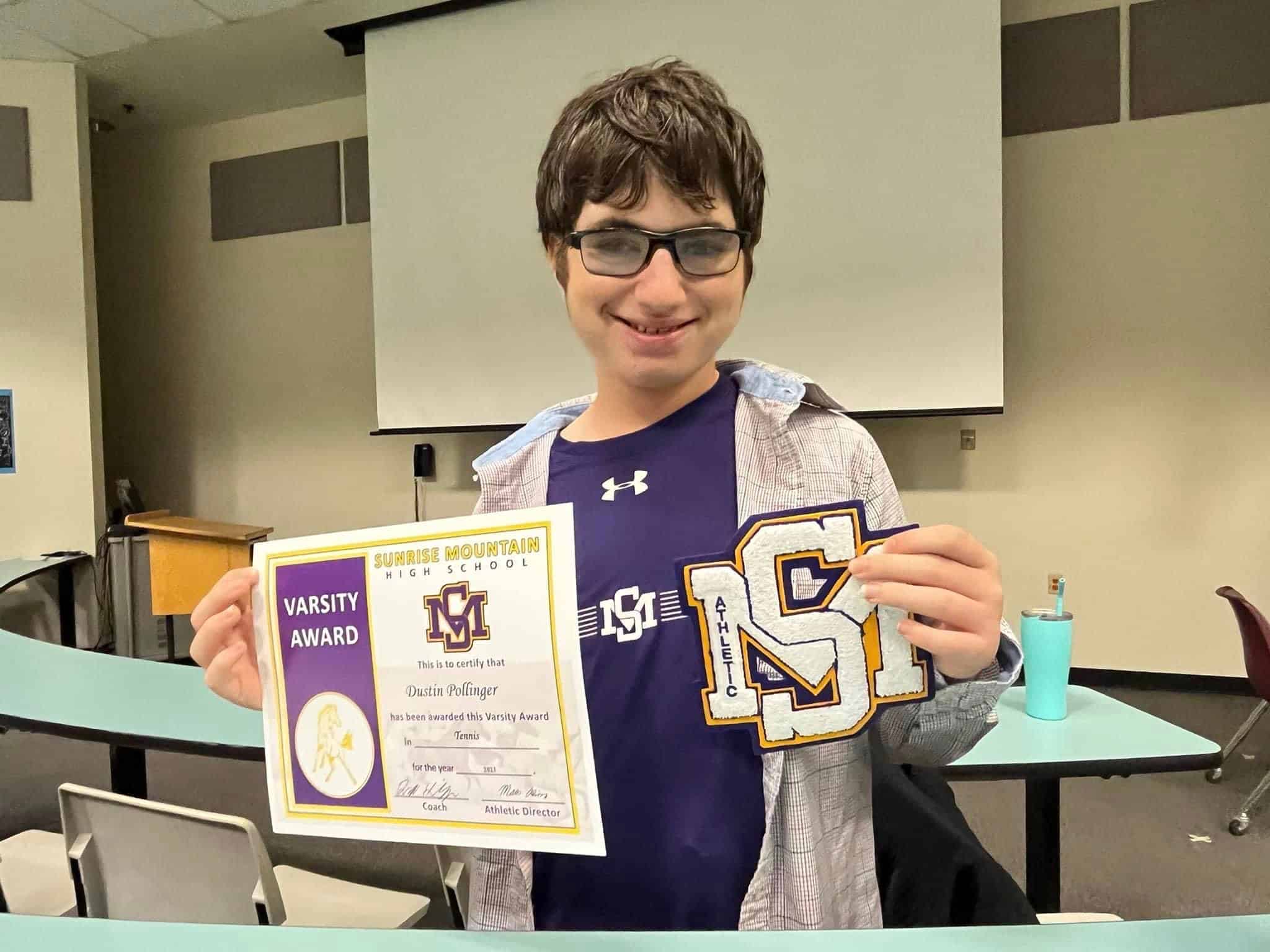 Dustin earns Varsity letter for tennis at Sunrise Mtn High School!  Congrats to the team!  Go Dustin!