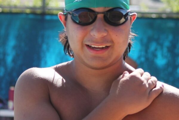 Phoenix at the pool with the swim team.