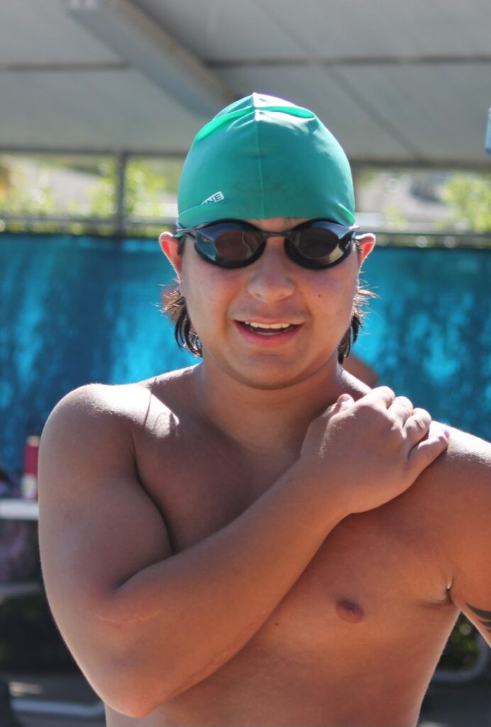 Phoenix at the pool with the swim team.