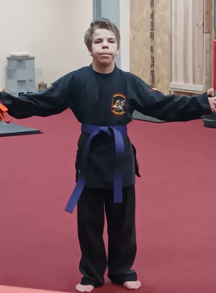 Brendan earned his purple belt in Karate!  GO Brendan!